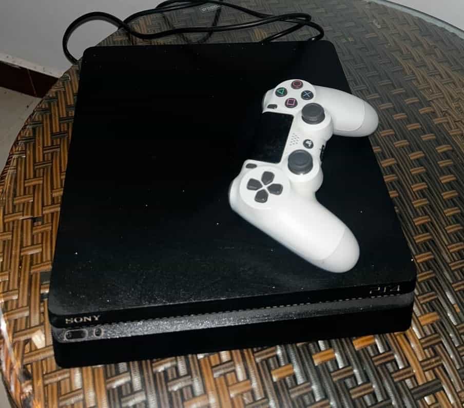 Sony PlayStation 4 1TB Black with 3 Controllers and 5 Games